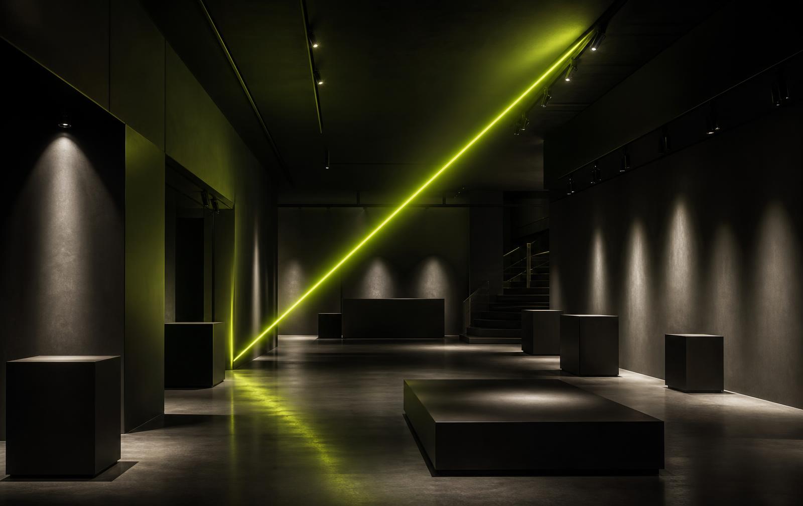 Espace d'exposition minimaliste, traité en noir et vert néon